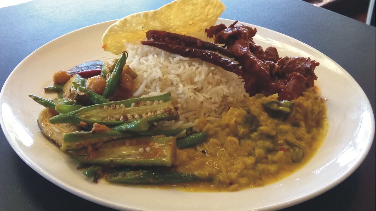 Steamed Rice with Meat Curry, 2 vegetable Curries,  & Pappadam