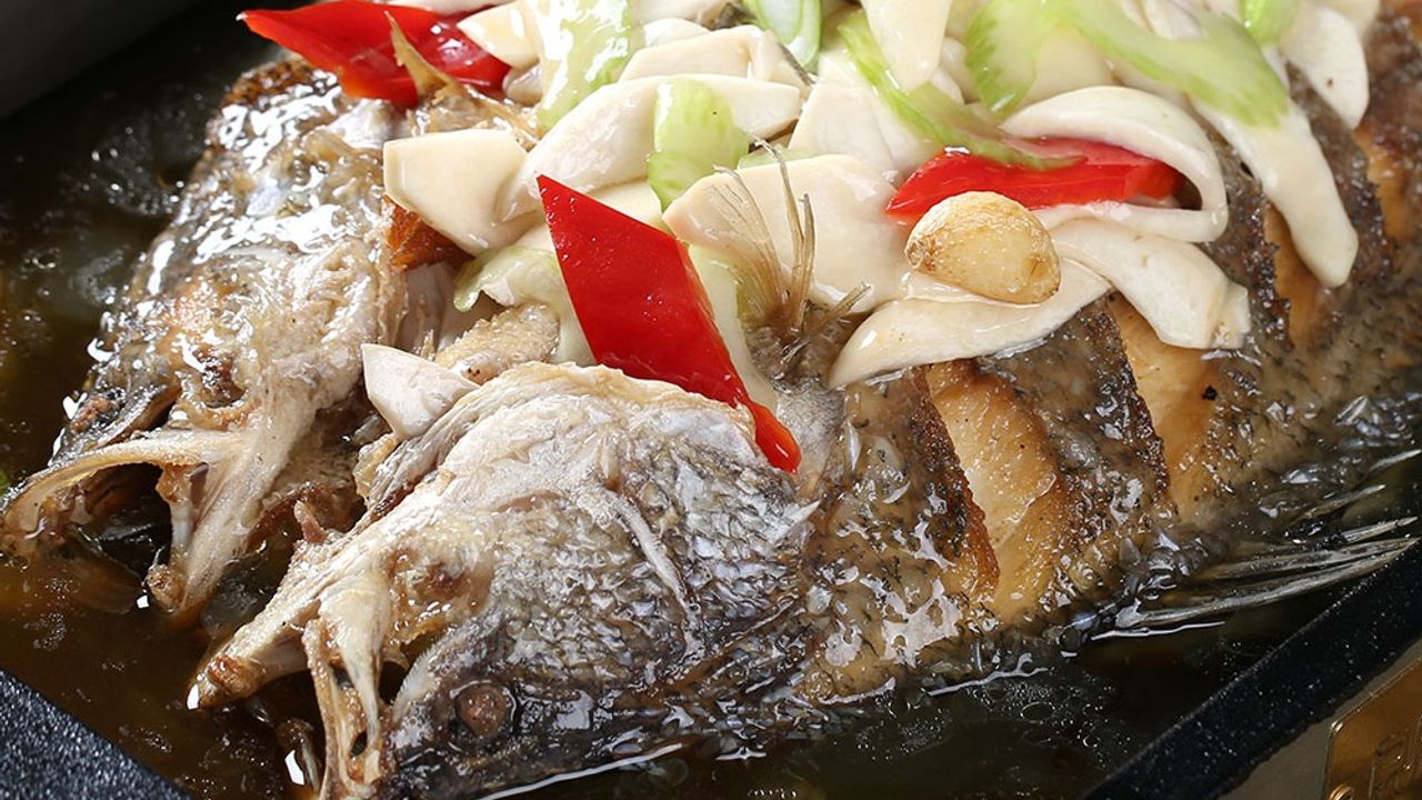 BBQ fish in chicken soup with oyster mushroom