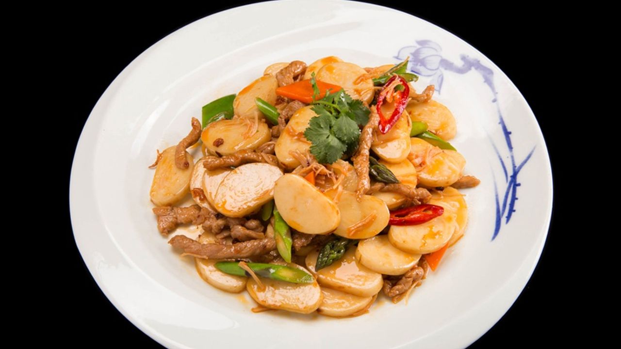 J13. Stir Fried Rice Cake with Pork & XO Sauce