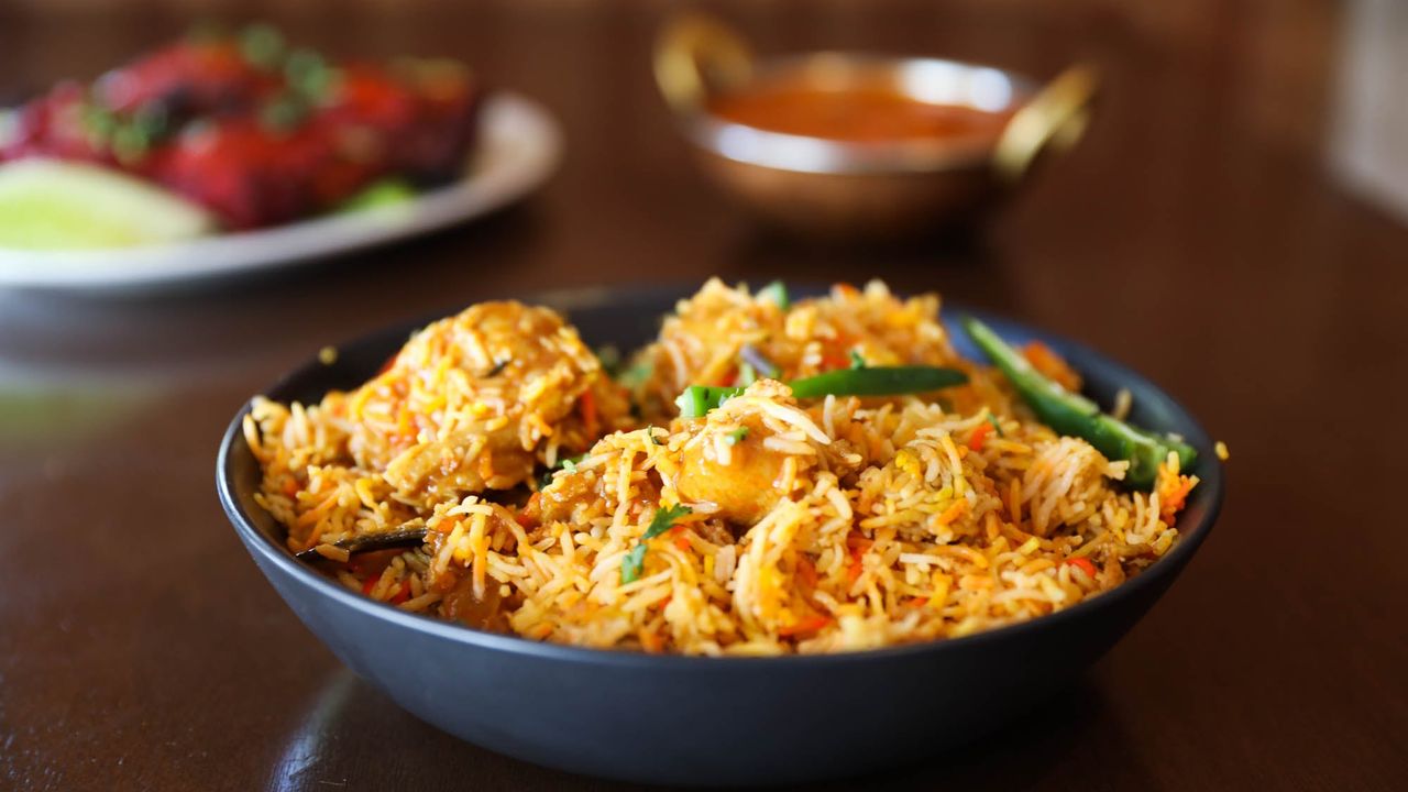 Mughal Biryani (Served with Raita)