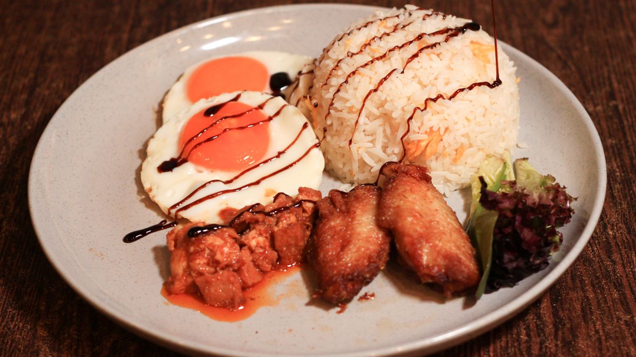 Spicy Pork and Chicken Wings and Fried Eggs on Egg Fried Rice