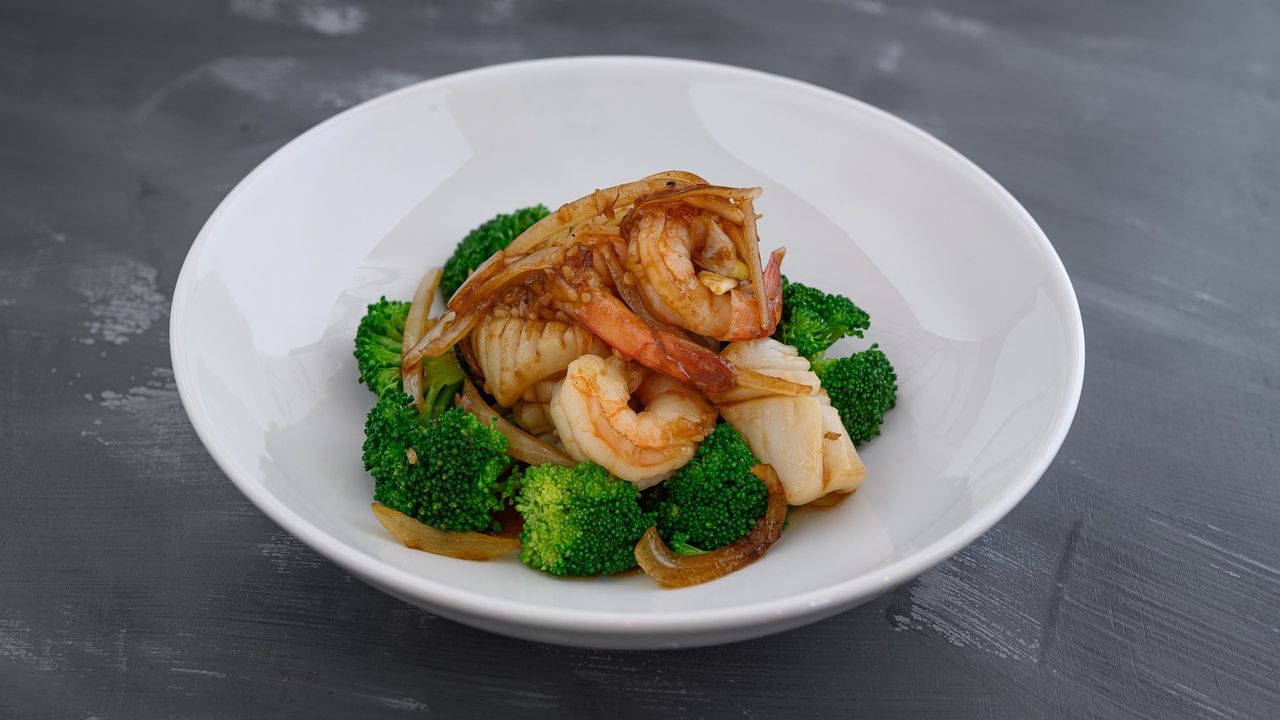 Stir Fried Garlic and Pepper Sauce (served w/ complimentary rice)