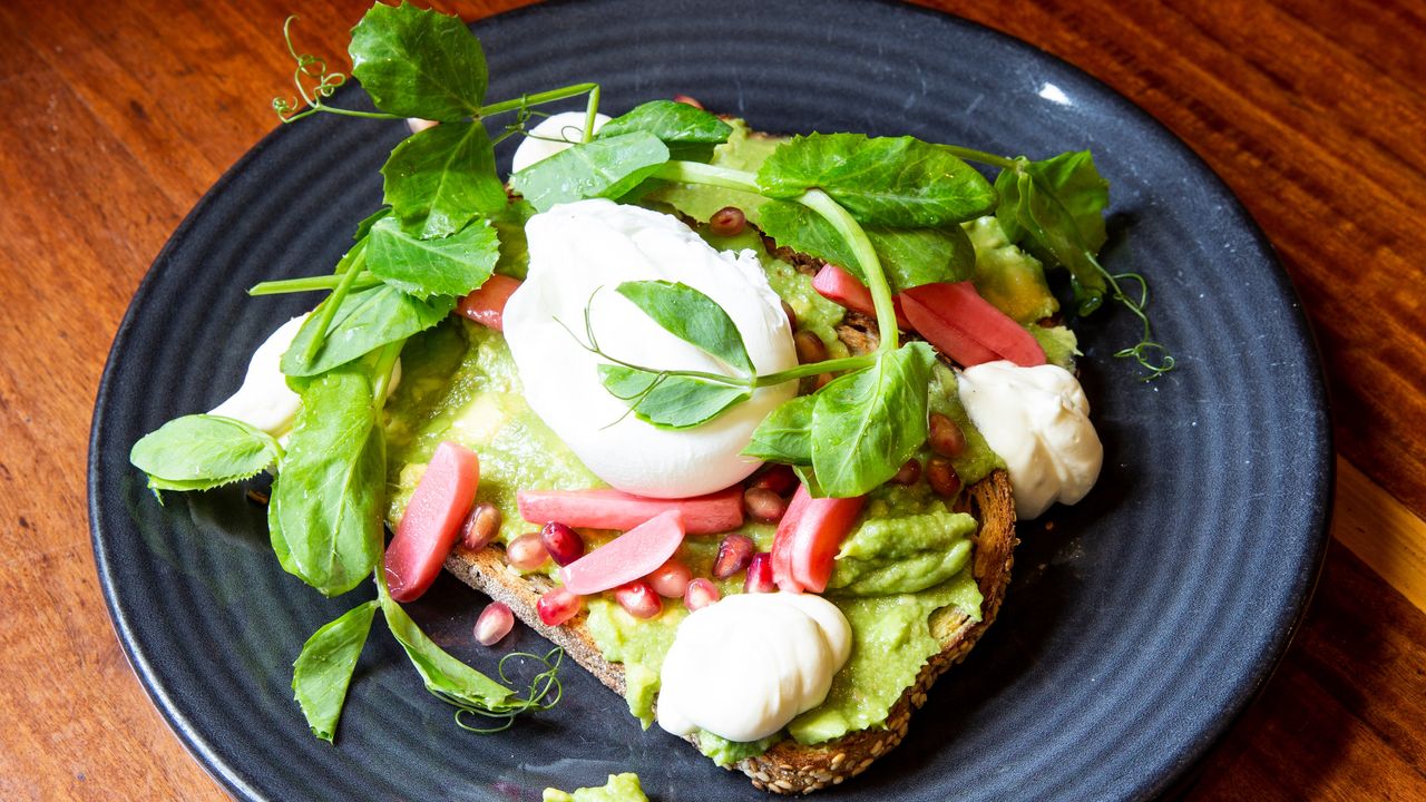 Smashed Avocado on Seeded Toast, Toasted Pumpking Seeds, Feta, Mint, Pomegranate & Poached Egg