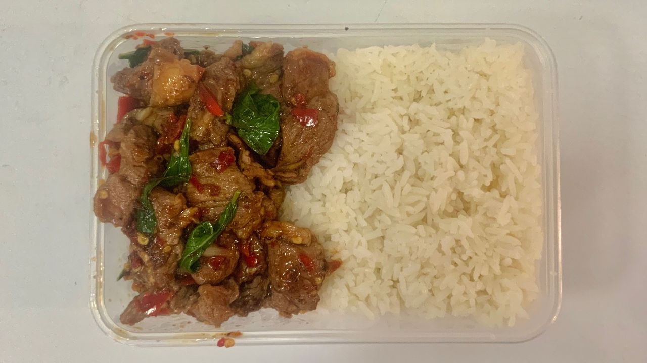 Basil stir fry with beef on rice กะเพราเนื้อราดข้าว