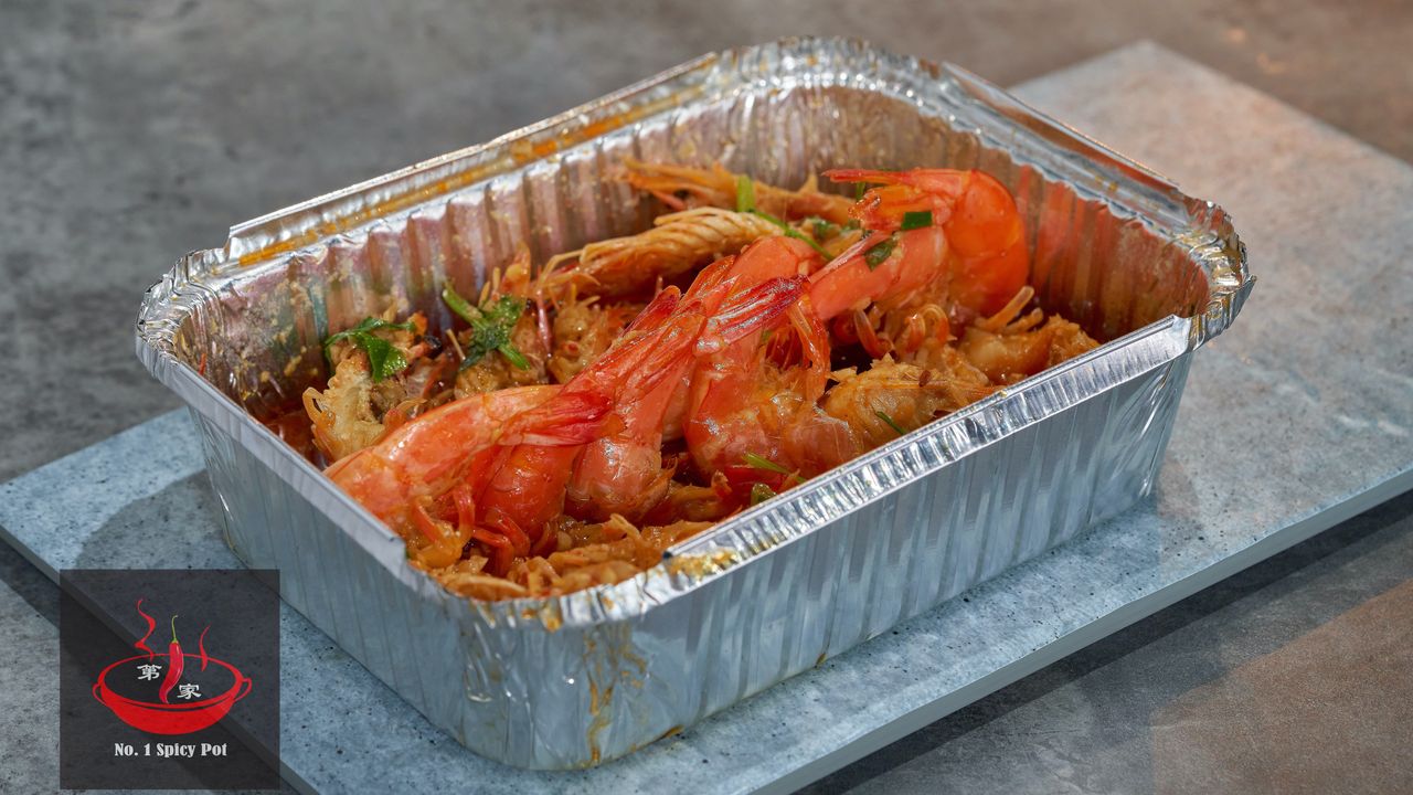 Tin foil grilled ope back prawns with garlic