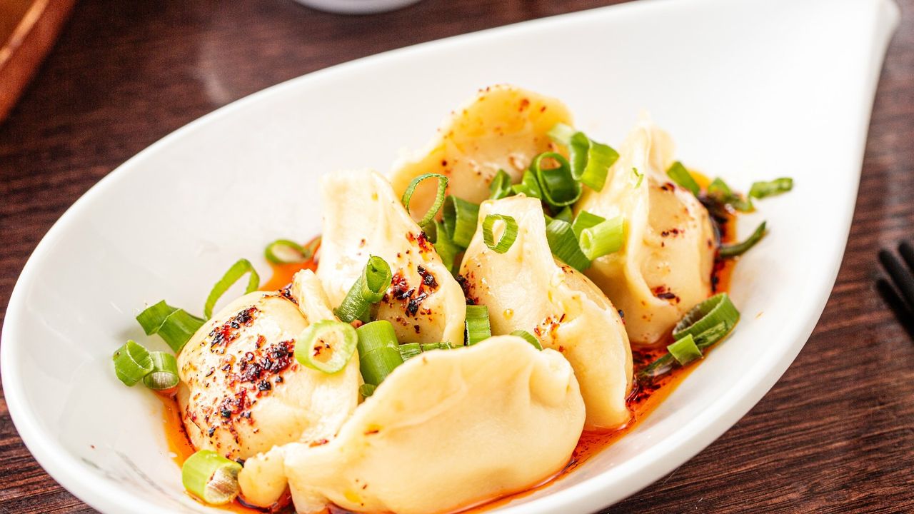 D10. Spicy Chicken Dumplings (12 Pcs.)