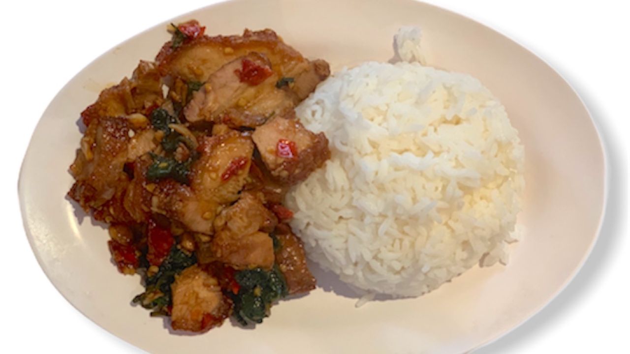 Stir Fried Basil with Crispy Pork กะเพราหมูกรอบราดข้าว