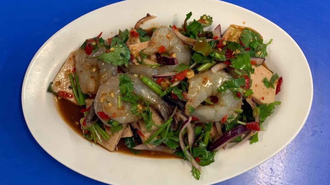 Raw prawns and pork loaf salad with fermented fish ยำปลาร้าหมูยอกุ้งสด