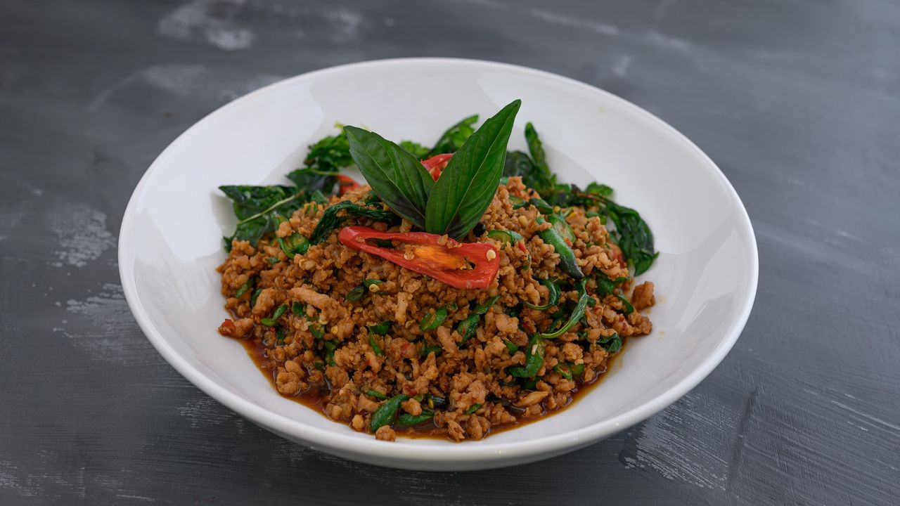 Stir Fried Chilli and Basil Sauce (served w/ complimentary rice)