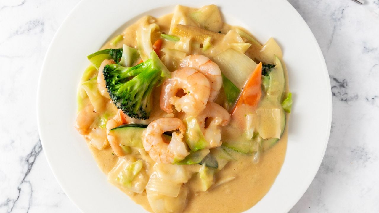 56. Garlic King Prawns