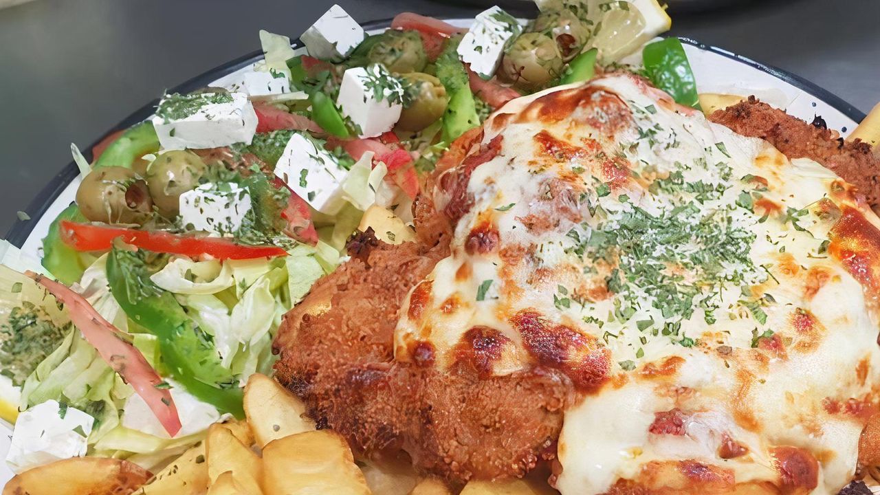 Chicken Parmigiana, Chips & Greek Salad