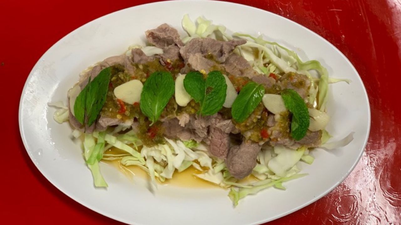 Marinated pork with seafood spicy sauce หมูมะนาว