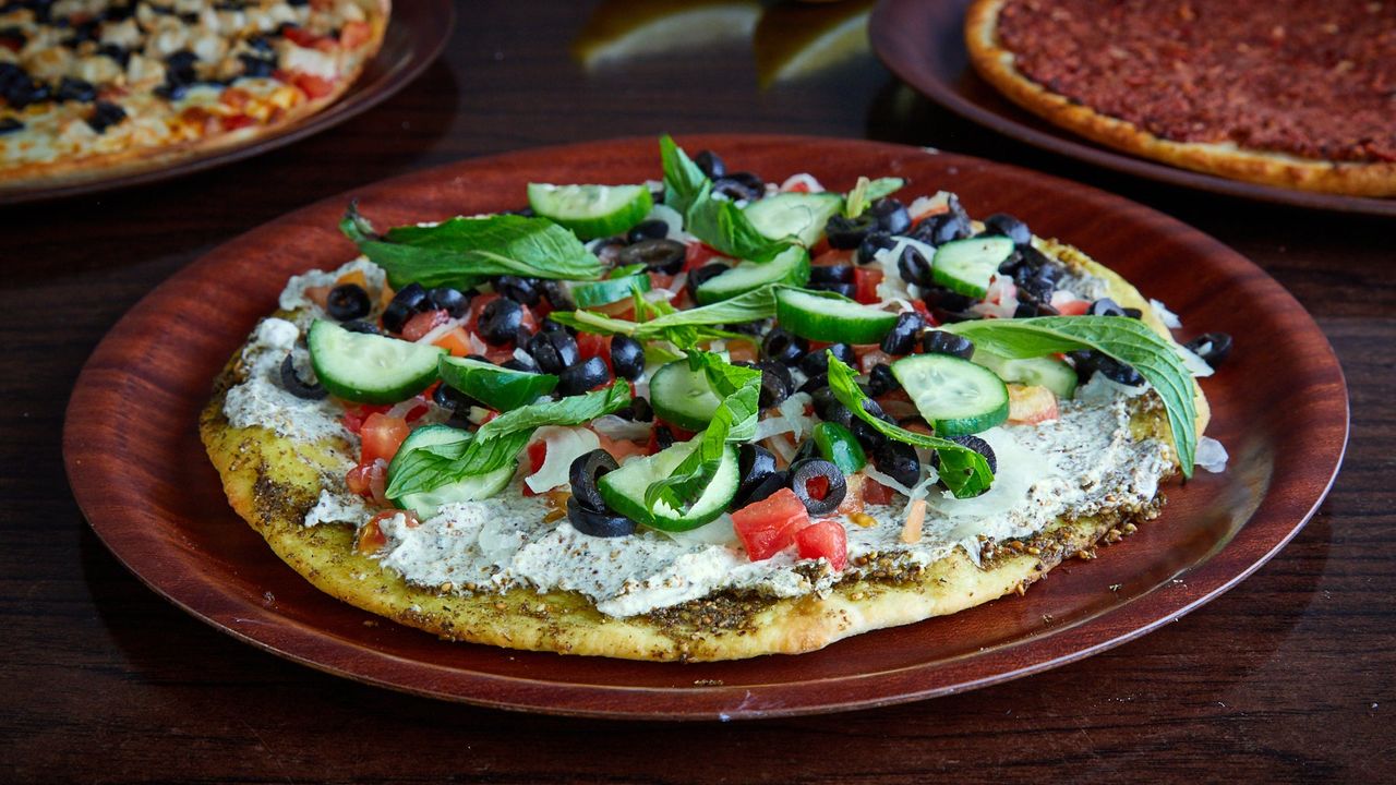 Oregano, Olives, Tomato, Labneh and Onion Pizza
