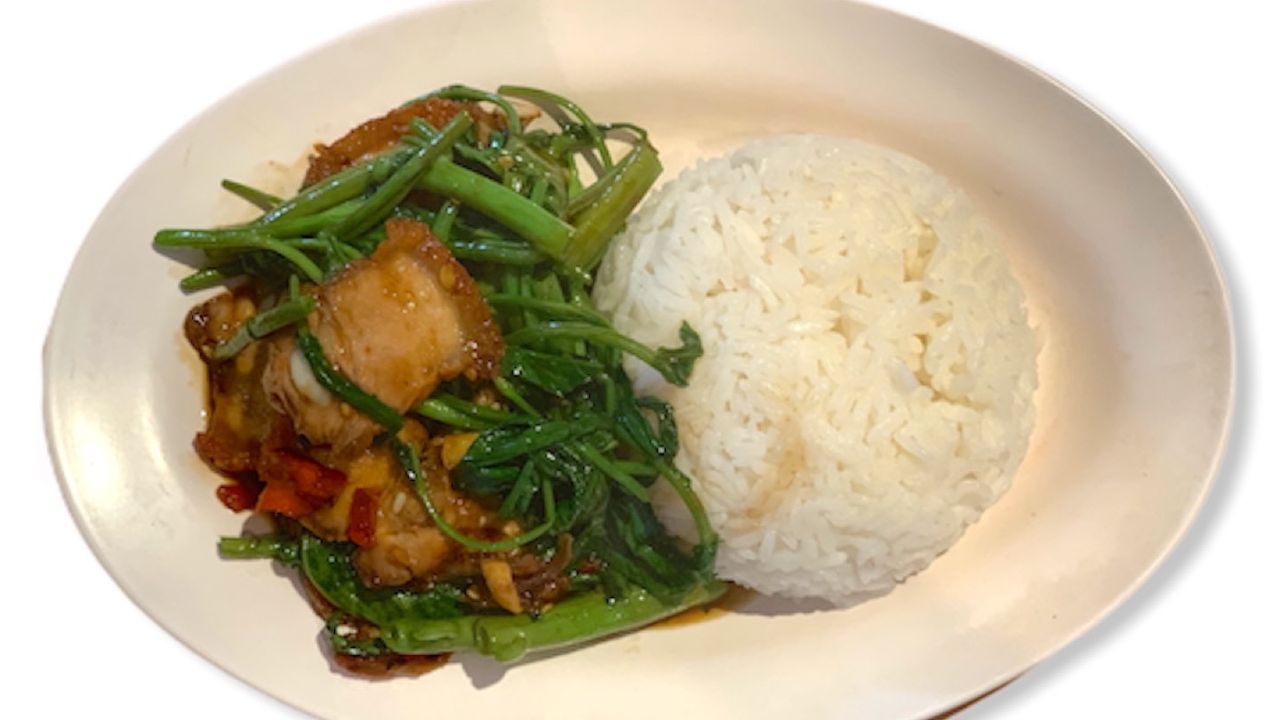 Stir Fried Water Spinach with  crispy pork  ผัดผักบุ้งหมูกรอบราดข้าว