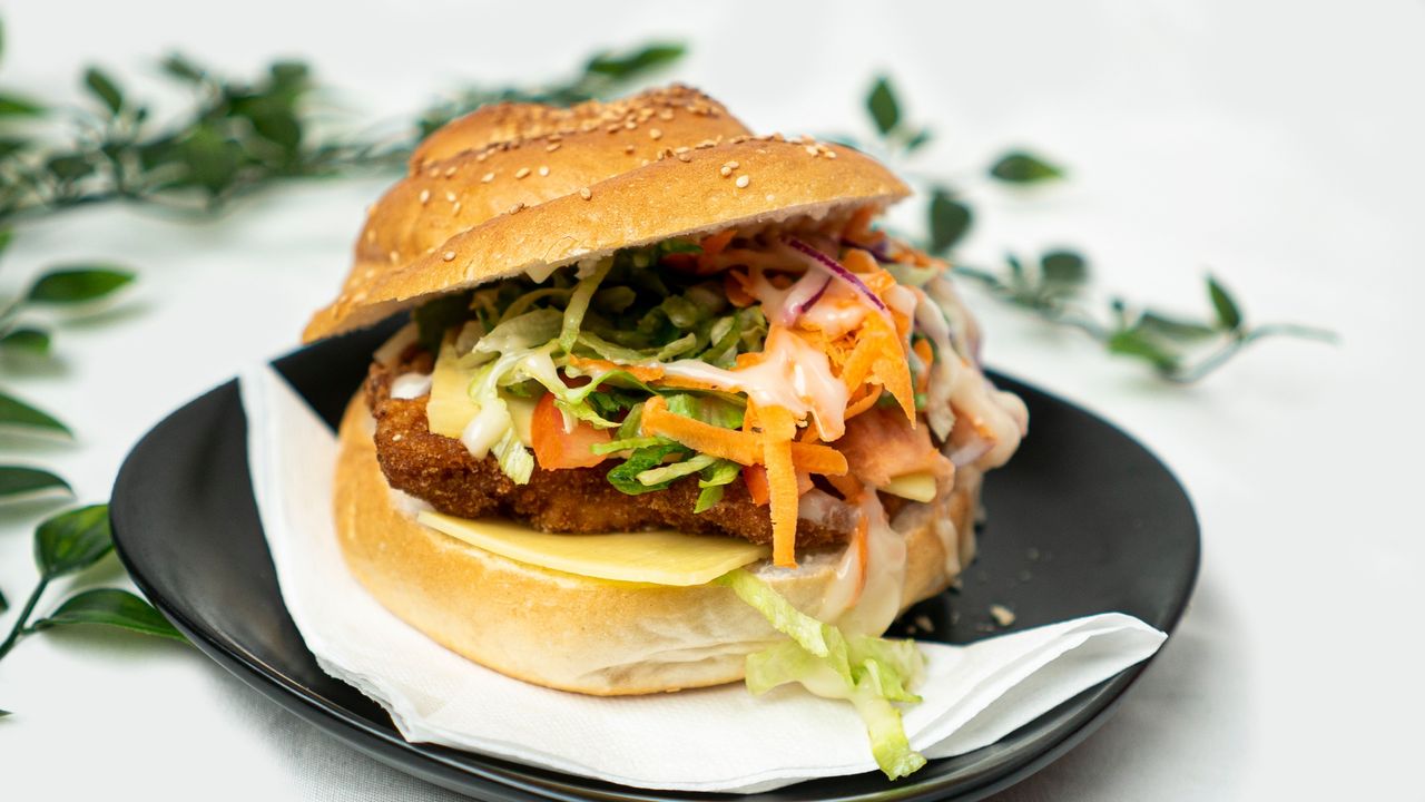 Chicken Schnitzel with Lettuce, Tomato and Onions