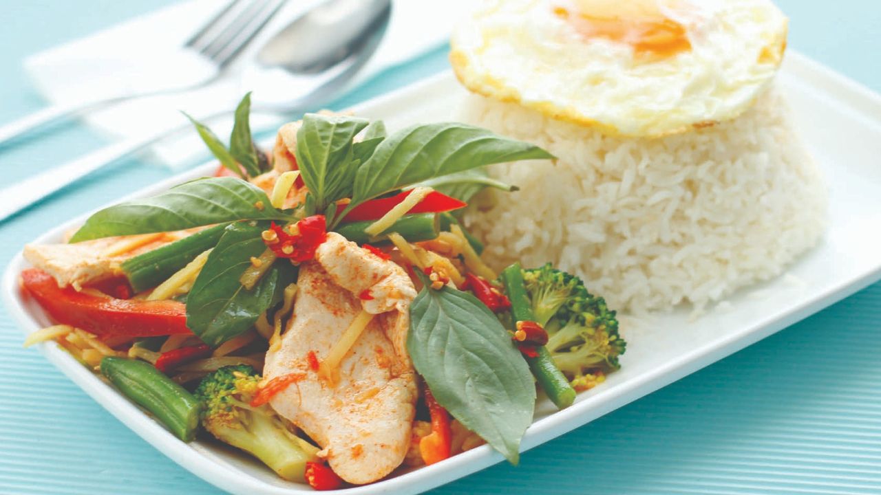 Basil Chicken With Fried Egg On Rice
