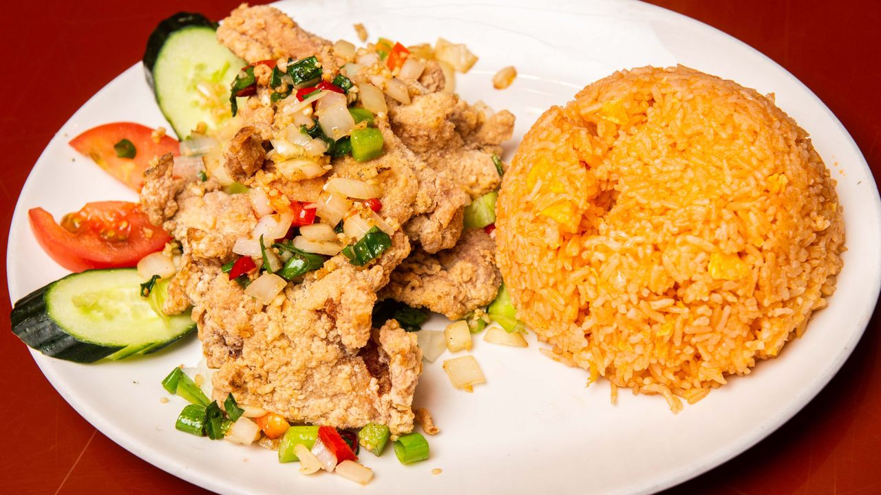 105. Tomato Rice w salt and pepper chicken ribs.