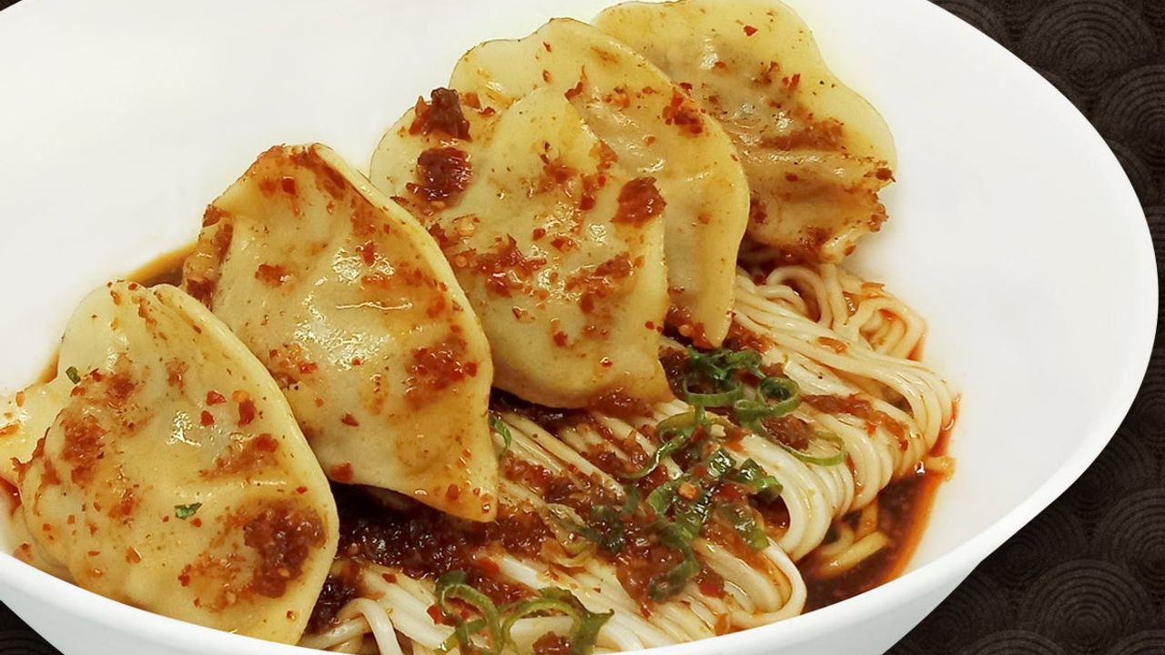 Seafood Dumpling Noodle with Spicy Sauce