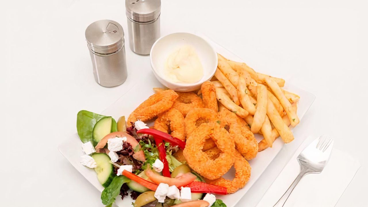 Crumbed Calamari, Chips , Sauce & Greek Salad
