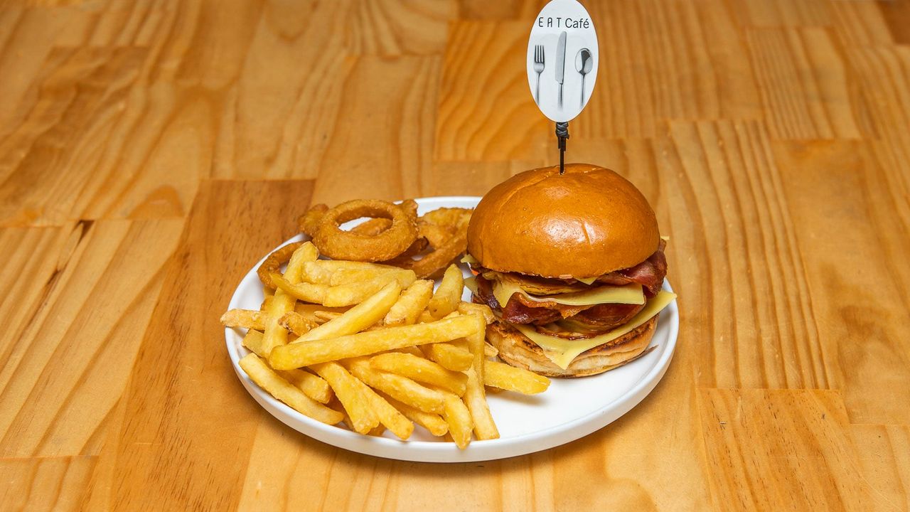 Layered Bacon, Egg Bun, and Fries