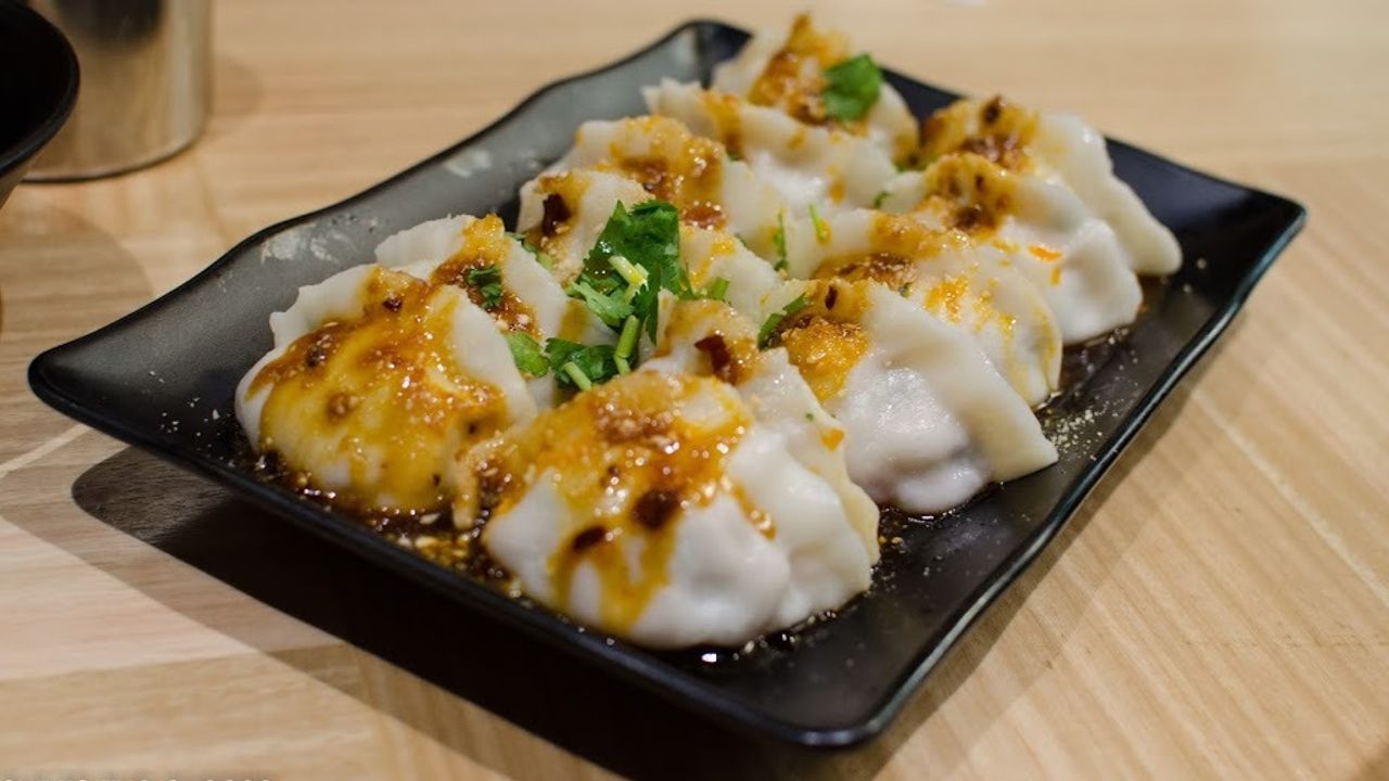 Steamed Pork Dumpling with Black Vinegar & Chilli Oil