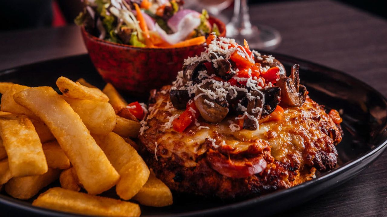 Loaded El Grande Parma with Fries and Salad