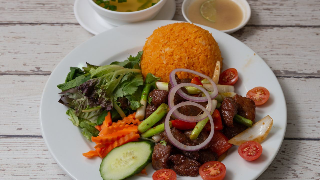 Tomato Rice with Marinated Diced Rump Steak and Green Salad