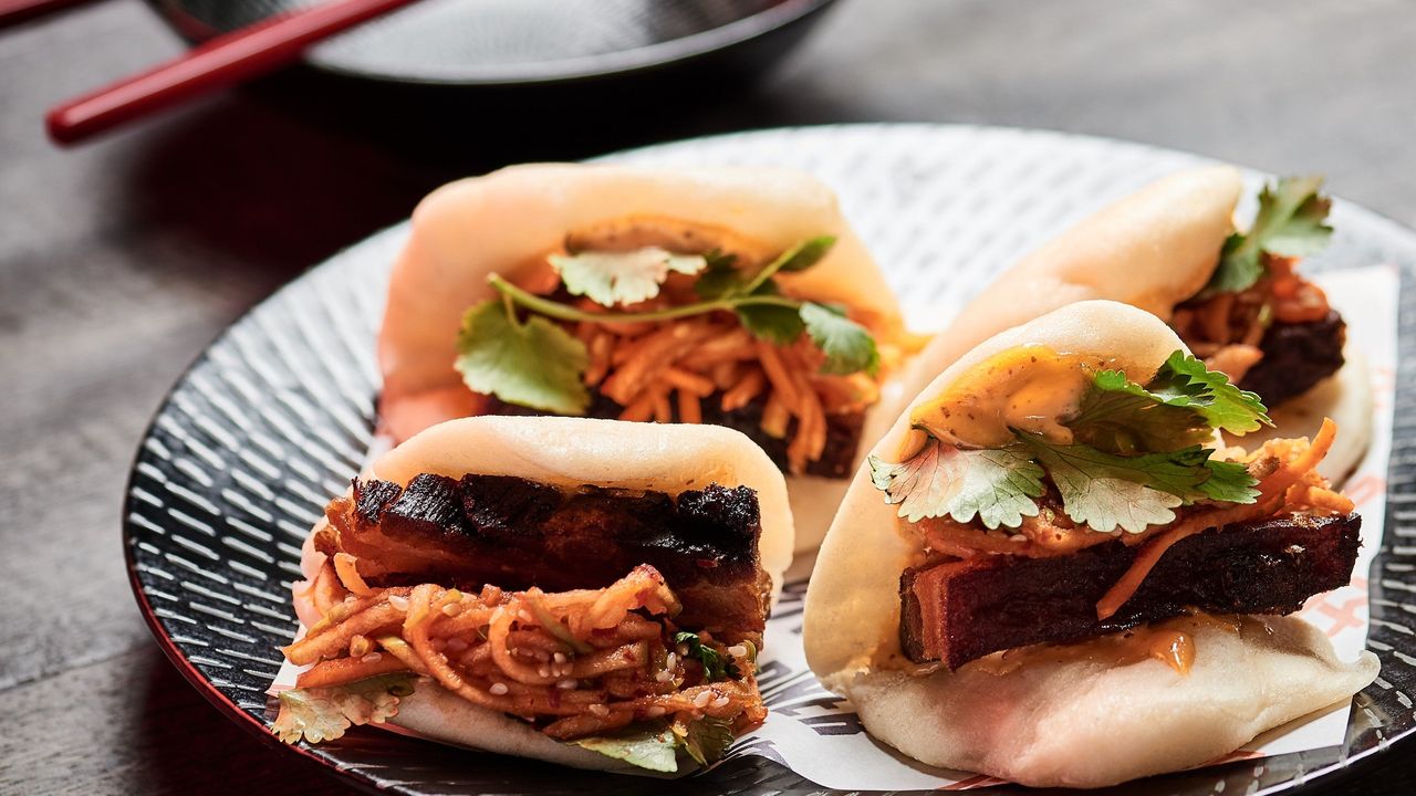 Crispy pork bao, apple & carrot kimchi, sriracha mayo