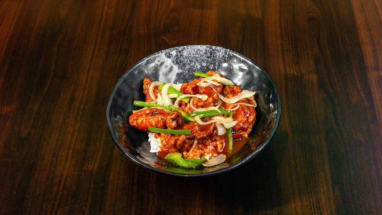 Chicken Ribs on Rice 鸡扒饭 (Spicy)