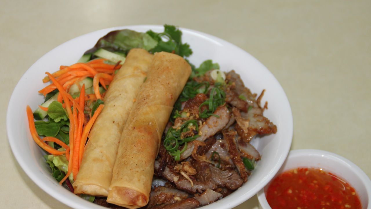 Grilled Pork And Spring Rolls On Rice Vermicelli