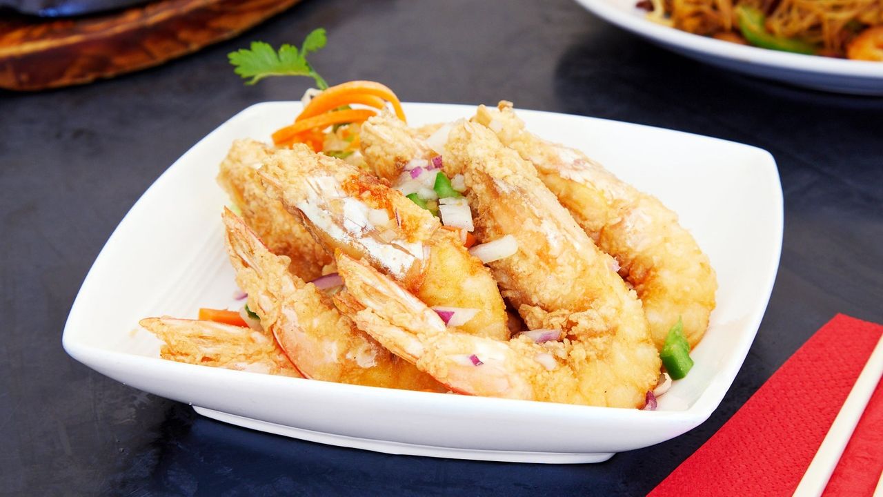 68 Salted spiced King Prawns