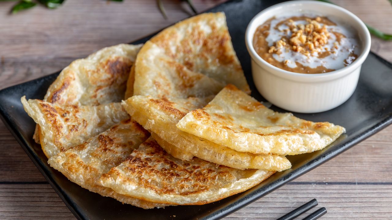 Buttered Roti Bread with Peanut Sauce