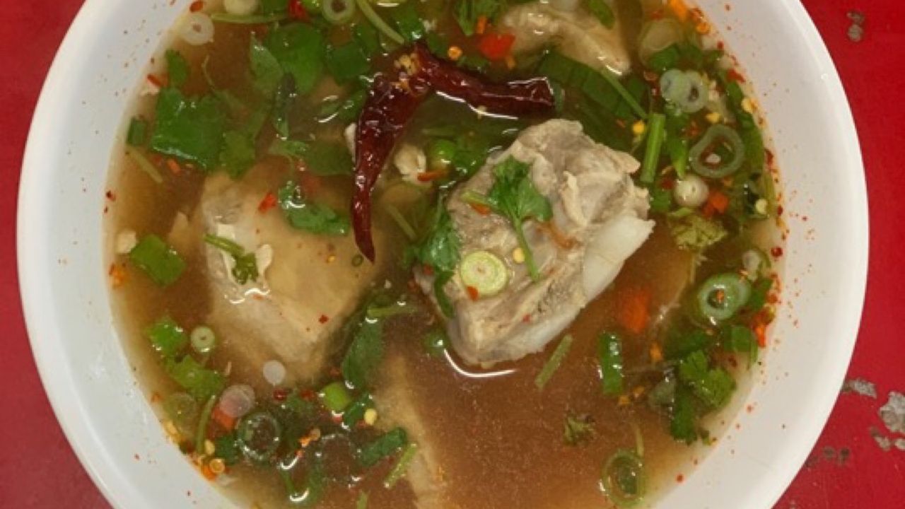 Spicy and sour soup with soft pork bone ต้มแซ่บกระดูกอ่อน
