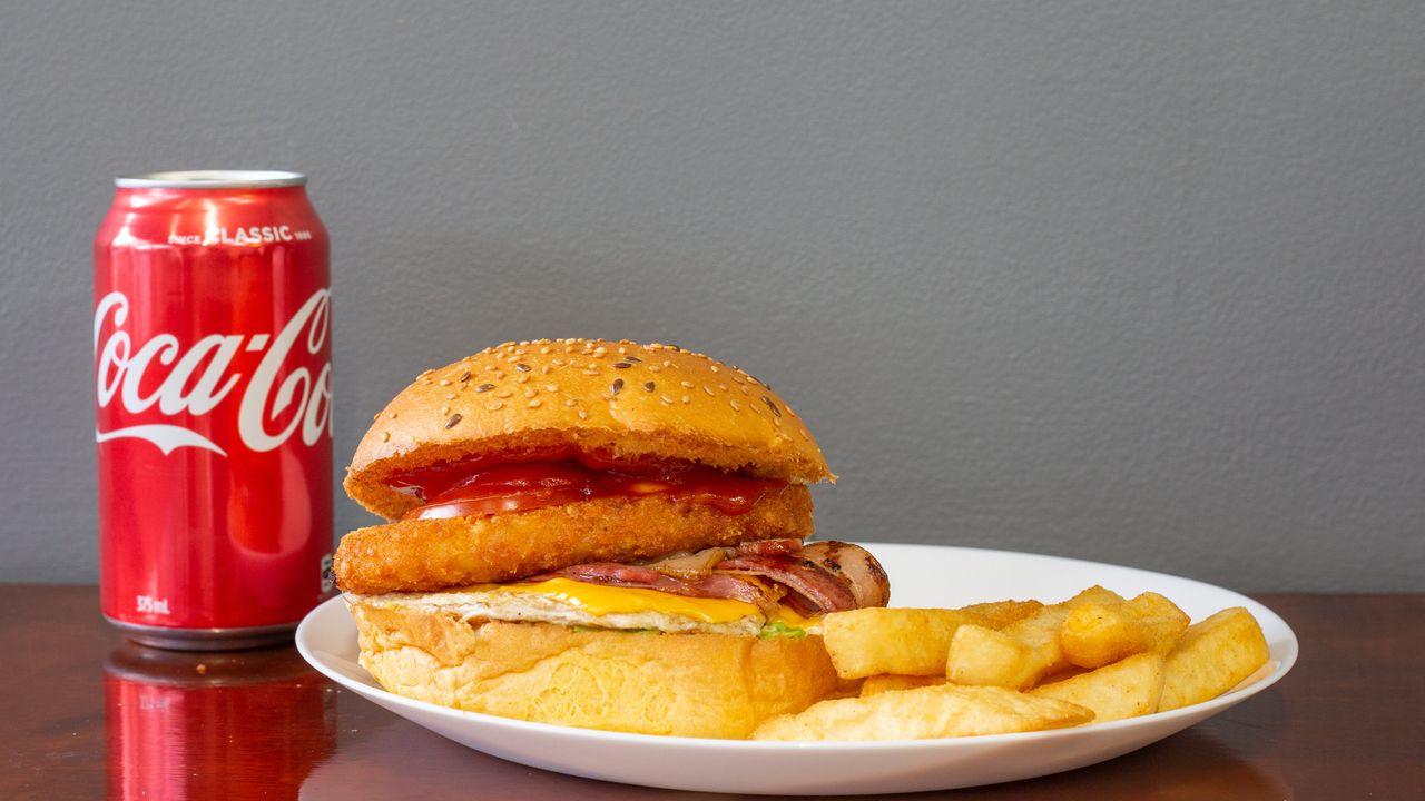 Chicken Schnitzel Burger with a Drink