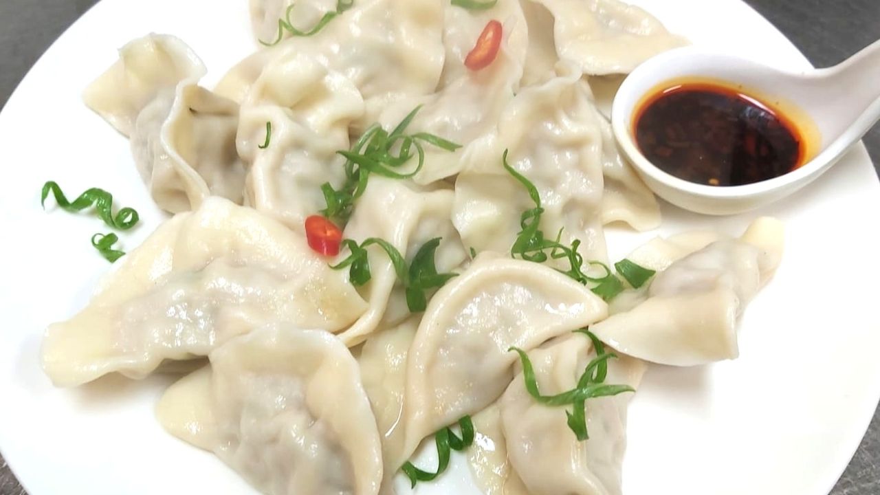 House Made Authentic Boiled Pork Dumplings (15 Pieces)