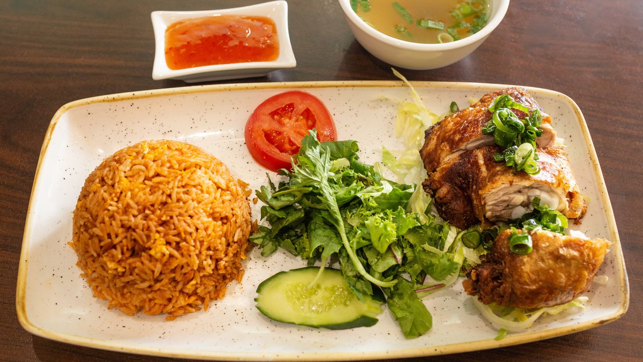 Crispy Skin Chicken on Tomato Rice