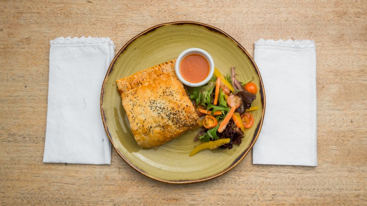 Housemade Sausage Roll, Side Salad & Tomato Relish