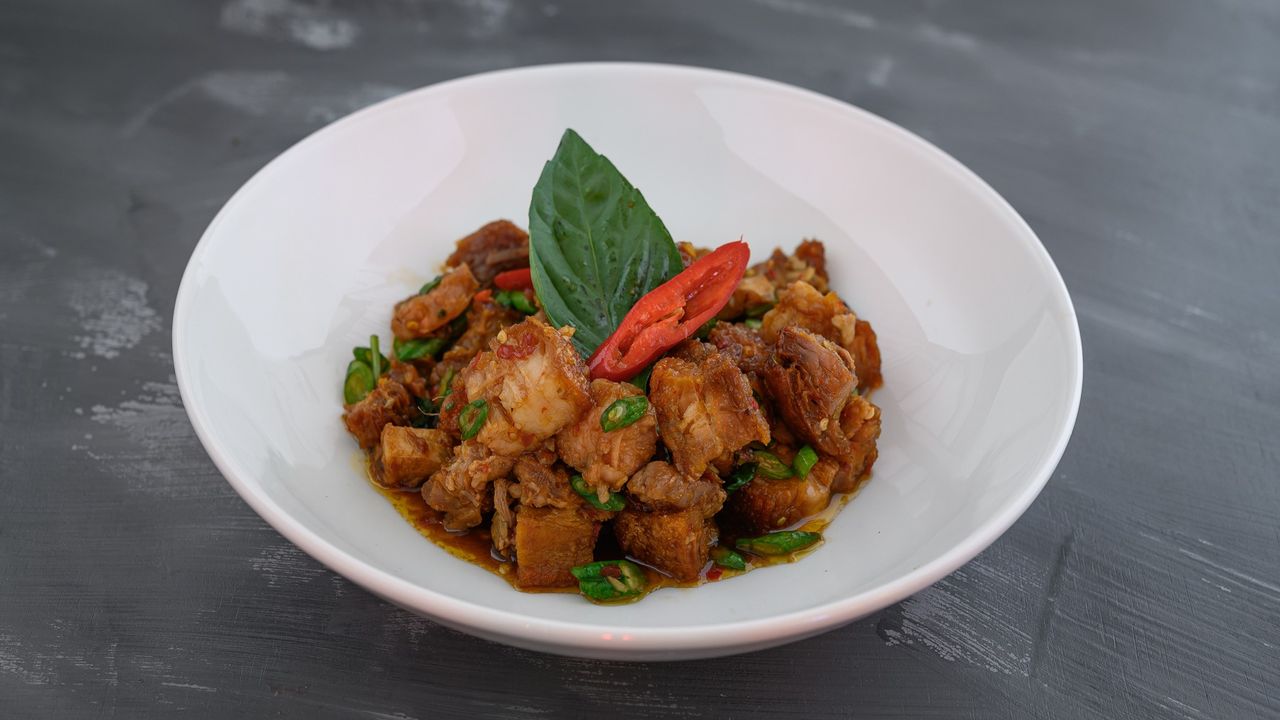 Stir Fried Crispy Pork with Chilli Basil (served w/ complimentary rice)