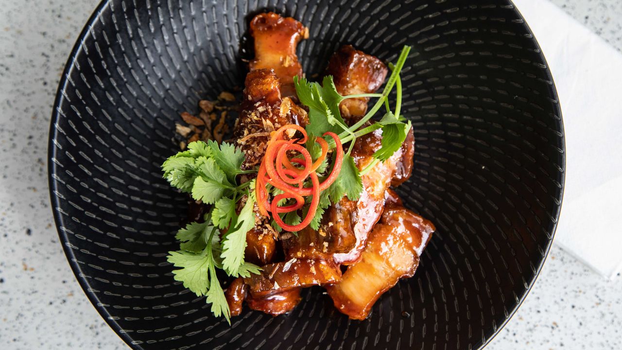 Crispy Pork Belly in a Sweet & Sour Spicy Sauce