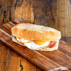 Bacon, Egg and Cheese Baguette Roll With Two Eggs