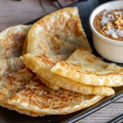 Buttered Roti Bread with Peanut Sauce